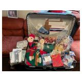 SUITCASE FILED WITH CHRISTMAS GIFTS, GLASS