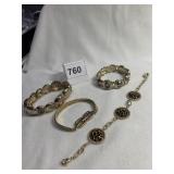 THREE GOLD TONE BRACELETS