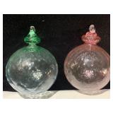 TWO KUGELS W/ HANGERS SIGNED BY BRIAN SUTHERLAND