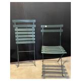 TWO STURDY FOLDING METAL CHAIRS