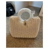 WICKER PURSE WITH PLASTIC PEARL LOOKING HANDLE