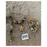 BAR W/ PEARLS AND INDIAN