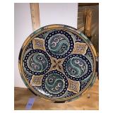 GLAZED POTTERY PLATE SIGNED BACK