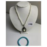 STERLING BROACH PENDANT W/ 16" CHAIN AND BLUE