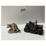 ANTIQUE CAR PENCIL SHARPENER AND RACCOON FIGURINE