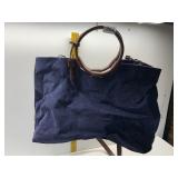 FOSSIL BLUE CORDUROY PURSE WITH FLORAL LINING,