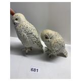 PAIR OF SNOWY OWL FIGURES WITH SPIKES ON FEET TO