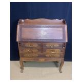 INLAY CENTER AND DETAILED CARVED FLOWERS ON FRONT