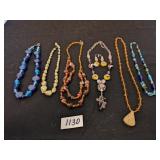 GROP OF FIVE GLASS BEADED NECKLACES