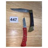 BUCK KNIFE WITH RED PLASTIC HANDLE AND WOOD