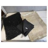 4 BLACK PLACEMATS, 4 BLACK CLOTH NAPKINS, 3 BEIGE