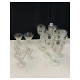 7 SILVER LEAF WINE GLASSES AND 7 GOLD FLORAL