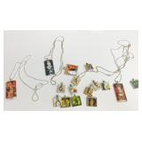 THREE NECKLACE CHAINS WITH GLASS PENDANTS