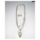 GOLD TONE METAL PENDANT NECKLACE WITH TURQUOISE