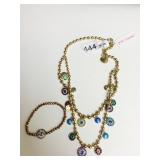 BETSEY JOHNSON GOLD TONE NECKLACE WITH ASSORTED