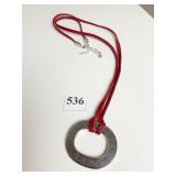 BRIGHTON LARGE OVAL SILVER TONE PENDANT ON RED