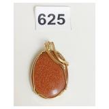 COPPER COLOR SPARKLE STONE IN GOLD TONE SETTING