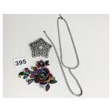 LARGE DARK METAL COLORED STONE FLOWER PIN CARA