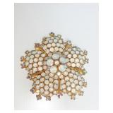 NORDSTROMS FLOWER PIN WITH WHITE STONES POSSIBLY