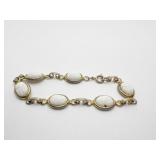 8" BRACELET WITH 6 WHITE CARVED STONES