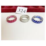 THREE RINGS ONE BLUE STONES ONE RED STONES ONE