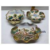 THREE RAISED DESIGN CAPODIMONTE PLATES