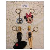 FOUR KEYCHAINS TWO VINTAGE BARBIE AND TWO DISNEY
