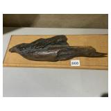 WOOD CARVED ON BOARD