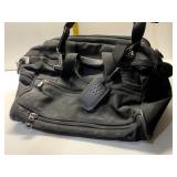 TRAVEL BAG W/ NEW LEATHER ID TAG