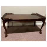 MAHOGANY COFFEE TABLE W/ CARED SIDES AND LEGS