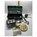 GREEN METAL TOOLBOX FILLED WITH ODDS AND ENDS,