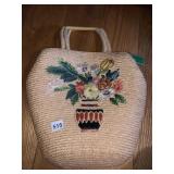 WOVEN PURSE W/ FLOWERS IN A VASE LEATHER HANDLES