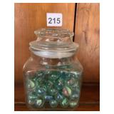 GLASS MARBLES IN JAR