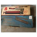 2 GREASE GUNS IN ORIGINAL BOXES