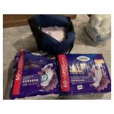 OVERNIGHT TENA INTIMATES PADS, ONE SEALED, ONE