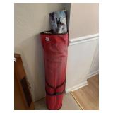 WRAPPING PAPER STORAGE BAG FILLED WITH WRAPPING