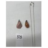 2 POLISHED STONE PENDANTS AND GOLD TONE CHAIN