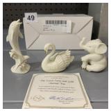 THE LENOX IVORY AND GOLD ANIMAL TRIO