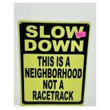 12X15 TIN SIGN "SLOW DOWN THIS IS A NEIGHBORHOOD