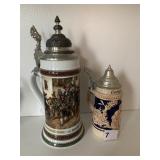 TWO STEINS BOTH GERMANY 10" H & 7" H ONE