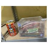 NFL FOOTBALL IN CASE AND PENGUIN COKE CAN