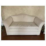 LINDER AND ASSOCIATES IVORY CURVED ARM LOVE SEAT