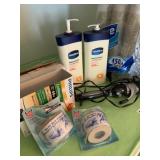 CURLING IRON, VASELINE MOISTURIZER,