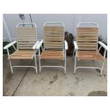 THREE FOLDING METAL FRAME CHAIRS