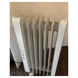 OIL FILLED HEATER WORKS WELL DIAL NEEDS RESET