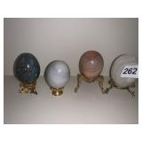 4 MARBLE EGGS W/ STANDS