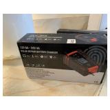 BATTERY CHARGER NEW IN BOX