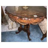 HEAVILY CARVED W/ DRAPED DESIGN TABLE 28" H X 26"