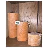 3 GRADUATED 3-6-9" CARVED CANDLES ONE CANDLE W/