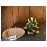 CHRISTMAS TREE AND BROKEN CANDLE AND RAISED